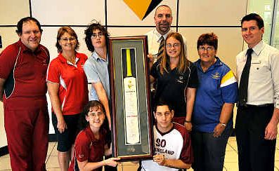(back from left) Stephen O’May, Ollie Langton, Ashlee Campbell, Commonwealth Bank manager Danny Weilman, Michelle Cotter, Merle King, Mark Butler and (front) Kimberley Langton and Elijah Bond with the signed cricket bat to help send Gympie Special Olympics athletes to Athens, Greece, next year. (back from left) Stephen O’May, Ollie Langton, Ashlee Campbell, Commonwealth Bank manager Danny Weilman, Michelle Cotter, Merle King, Mark Butler and (front) Kimberley Langton and Elijah Bond with the signed cricket bat to help send Gympie Special Olympics athletes to Athens, Greece, next year.